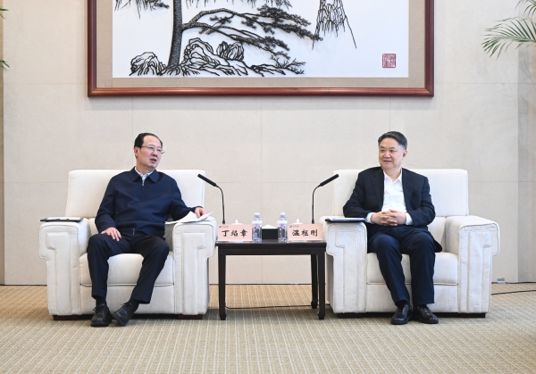 丁焰章與中國華能董事長、黨組書記溫樞剛會談